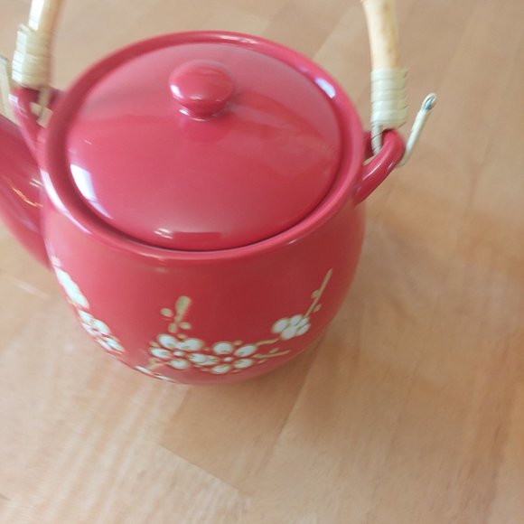 Red teapot with cherry blossom design in white with tan accent bamboo handle - Picture 4 of 12
